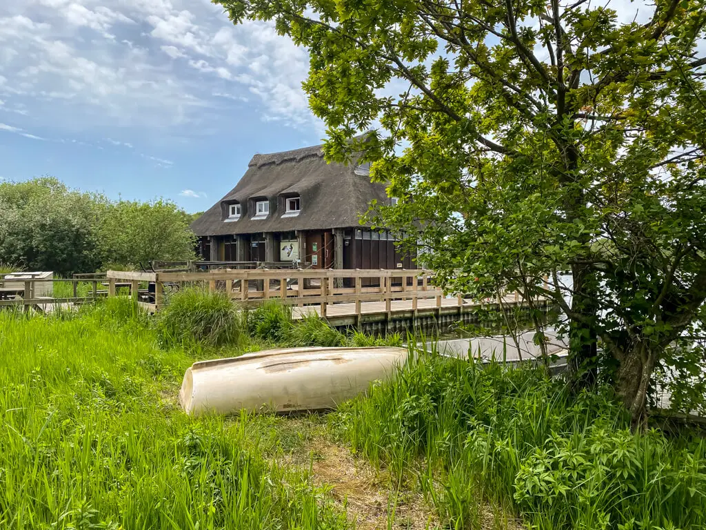 view of the floating wildlife centre (which look like a cute cottage) on Ranworth Broad