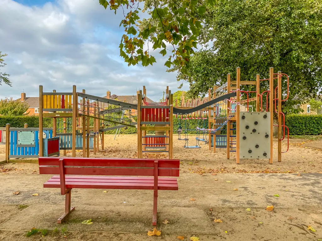 bench and children's playground at Eaton Park in Norwich