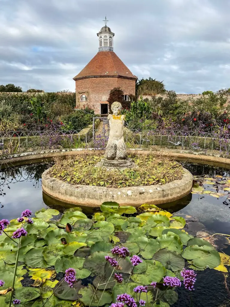 pond, fountain, and dovecote inside walled garden at Felbrigg hall
