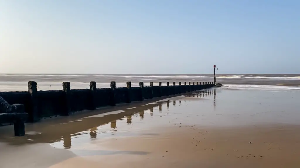 Sheringham beach at low tide where you can see lots of sand