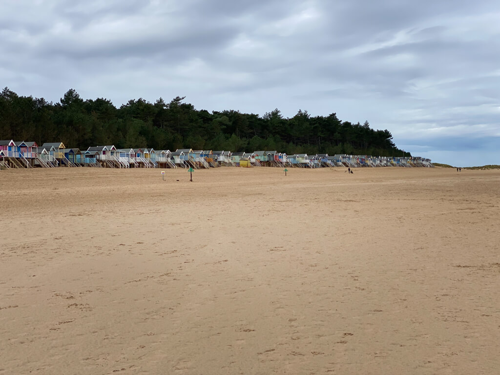 looking across the massive wells beach to the beach huts