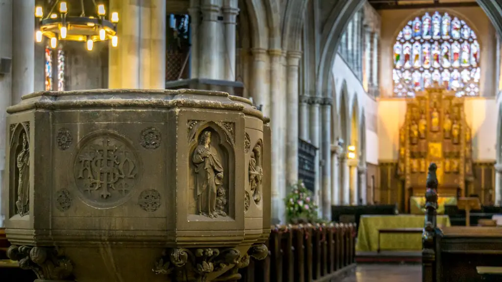 inside King's lynn minster with the font in the foreground