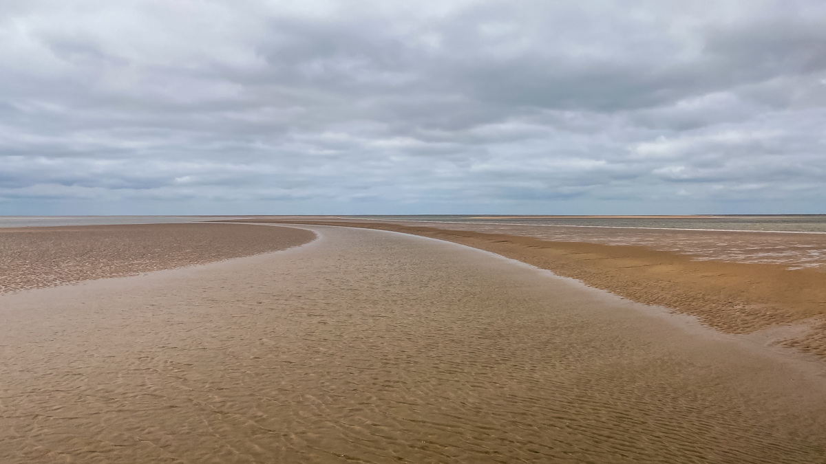 looking out from hunstanton beach at low tide