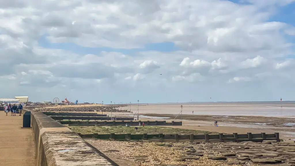 view of the hunstanton beach at low tide, some rocks, groynes, lots of sand