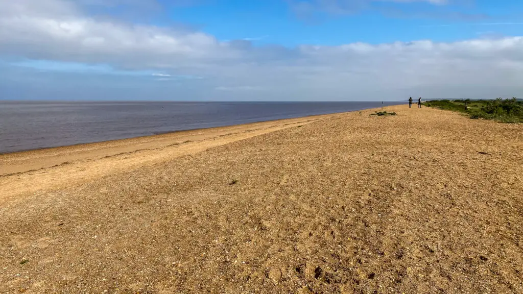 view of the sand/shingle and sea at snettisham beach in Norfolk