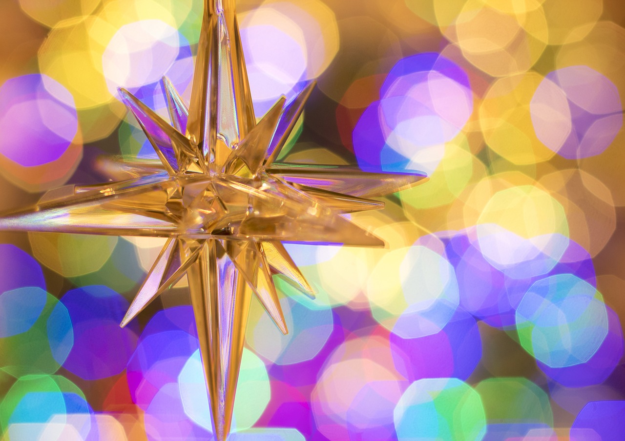 close up of a star and christmas lights