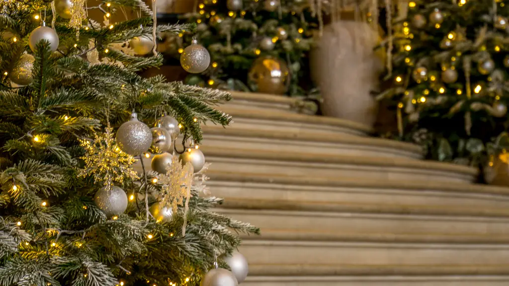 closeup of the christmas decorations along the stairs in the marble hall of holkham hall