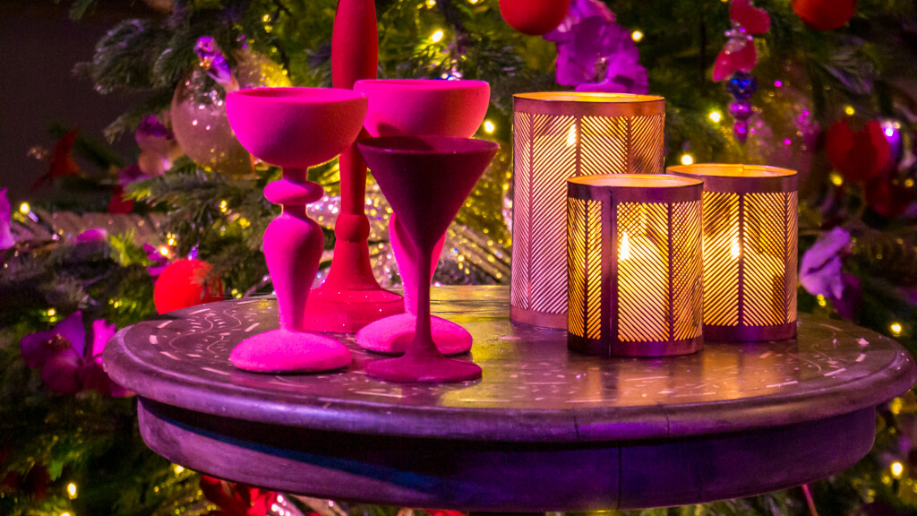 coloured wine glasses and candles in the Jewel Room at Holkham by Candlelight