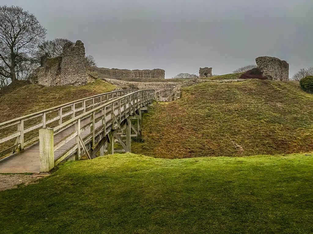 castle acre castle is ruins, but still quite impressive