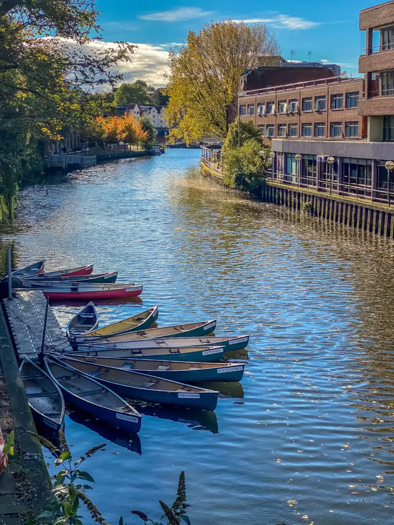 canoes ready to be hired on the River Wensum in Norwich