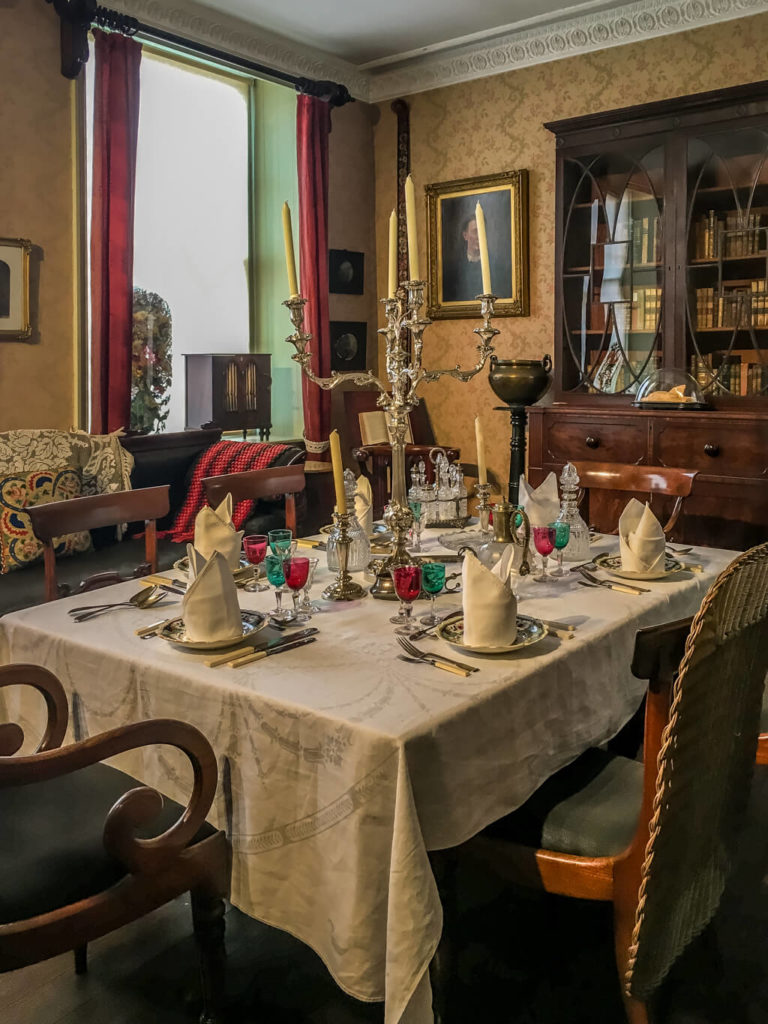 inside one of the rooms in the strangers hall museum in norwich set up as a dining room