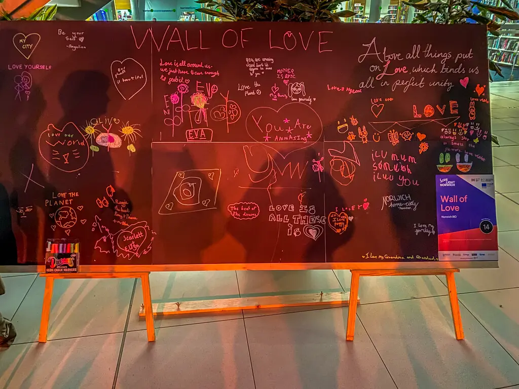 black board with messages of love - the wall of love from love light norwich