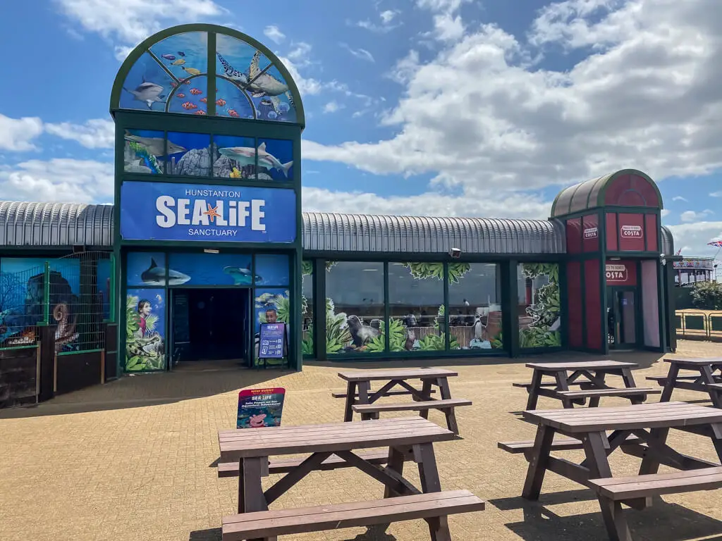 exterior of Hunstanton SeaLife Centre with picnic tables in front of it