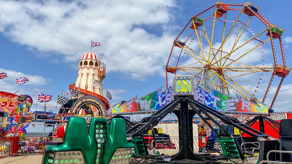 various rides like helter skelter, ferris wheel, and more at Rainbow Fun Park