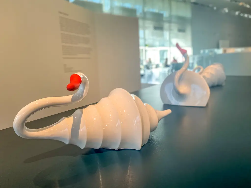 Slee's ceramic swans on display at the Sainsbury Centre in Norwich