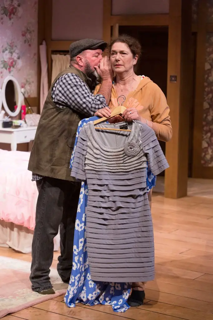 Earl whispers in Gail's ears in The Birds and the Bees at Norwich Playhouse