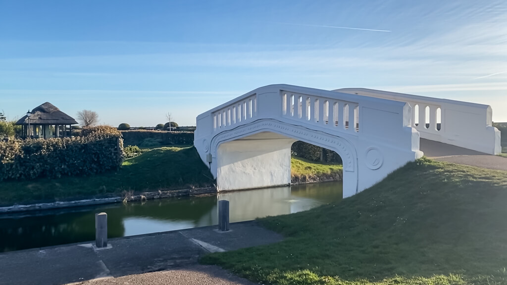 white arched bridge at the south entrance to the Venetian Waterways in Great Yarmouth.