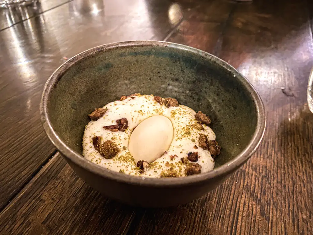 rice pudding served in a black bowl