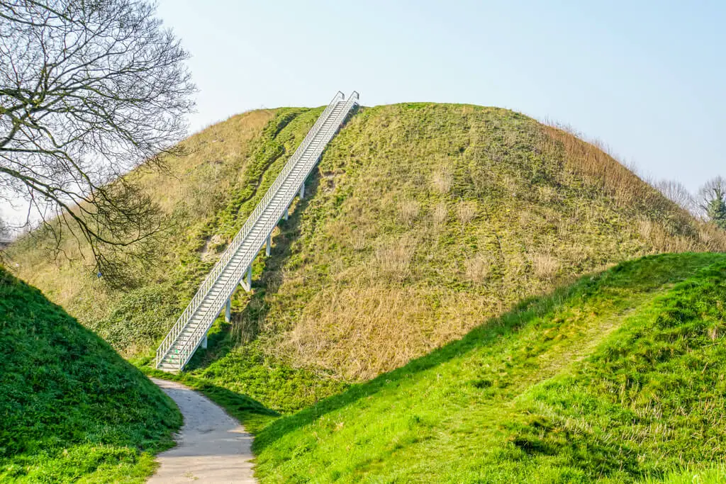 view of path leading to thetford castle mound, you can see stairs leading to the top