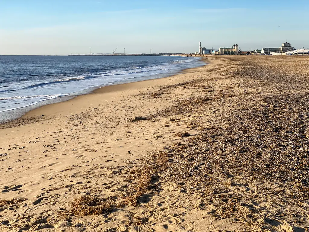 looking down great yarmouth beach towards the wellington pier