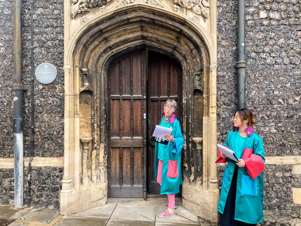 our tour guides in front of Bassingham Gate at norwich guildhall