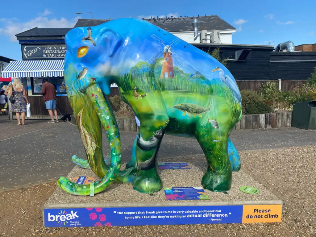 mammoth with scenes of norfolk painted on it