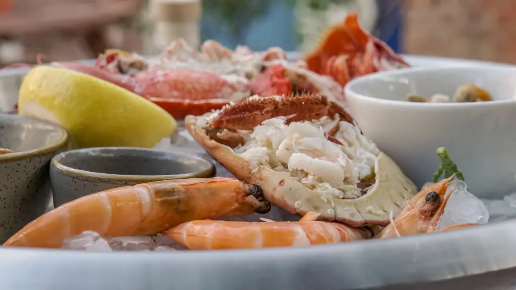 closeup of the coastal platter with shrimp in the foreground