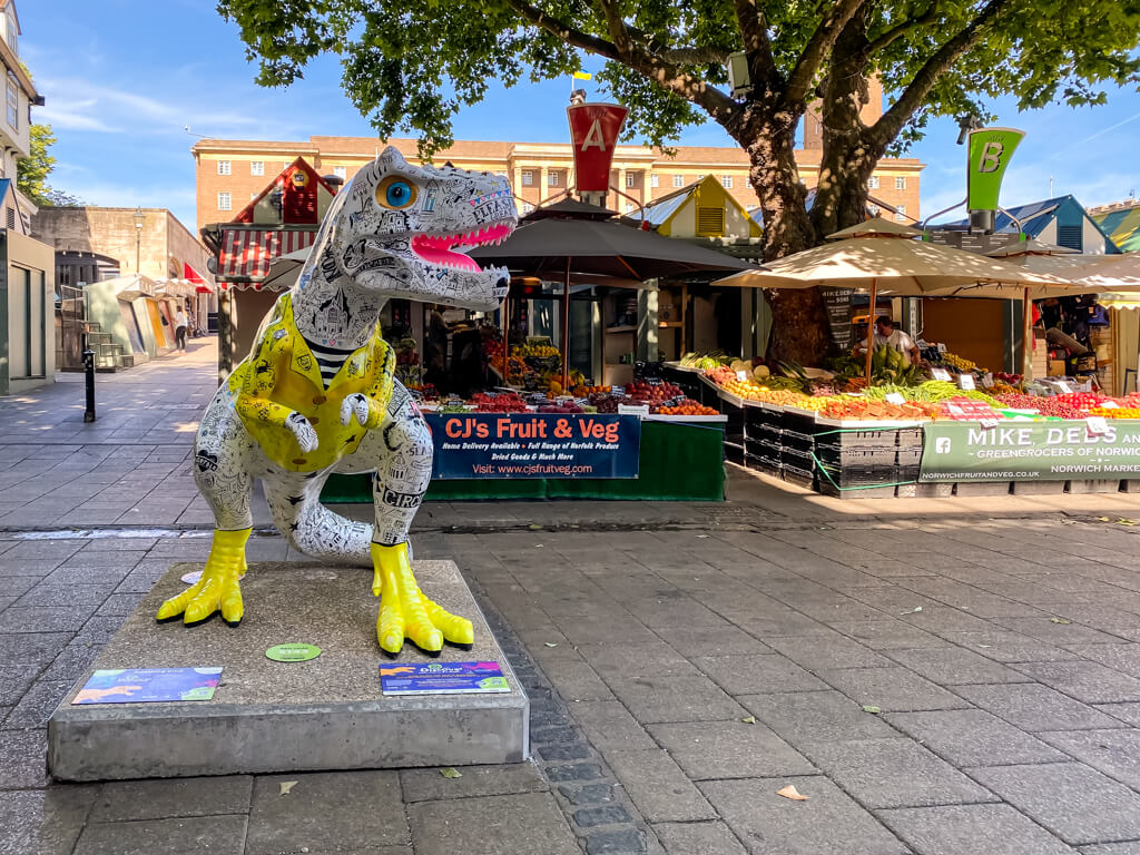t-rex in front of the Norwich market