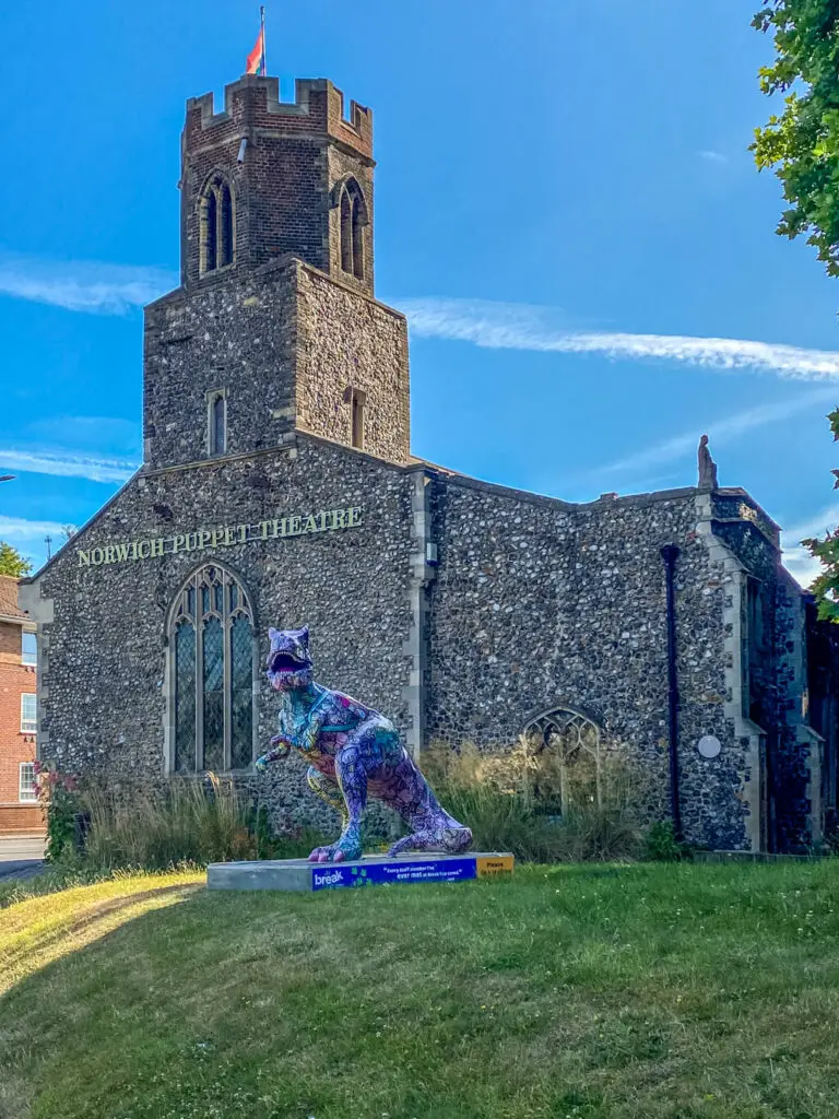 norwich puppet theatre with one of the gogodiscover t-rexes in front