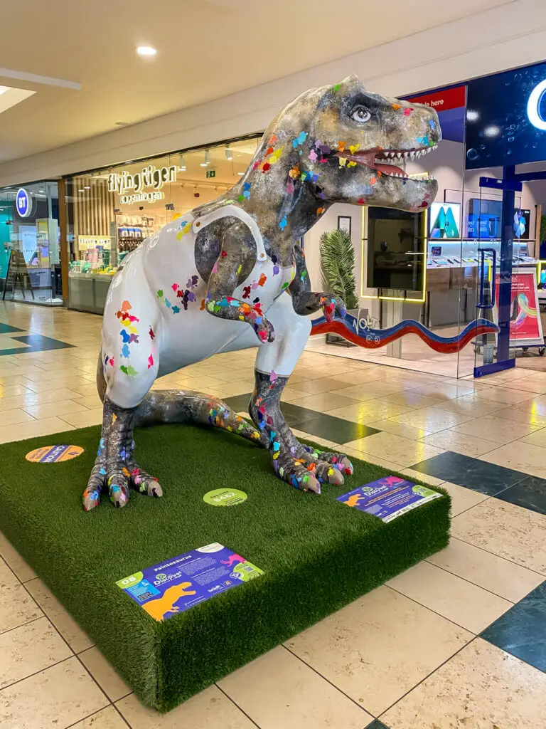 t-rex in overalls inside chantry place