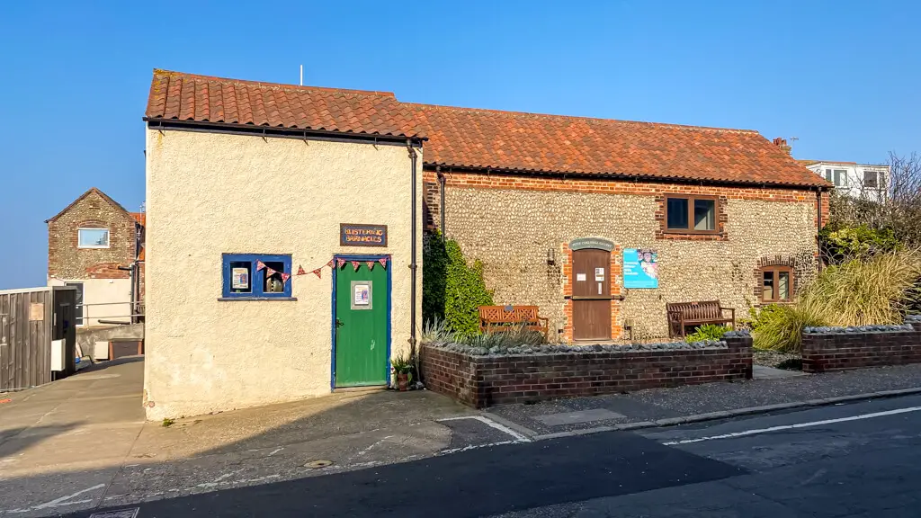 old building with two doors that houses the Peter Coke Shell Gallery