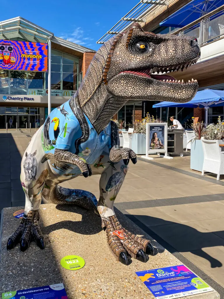 colourful t-rex in front of chapelfield