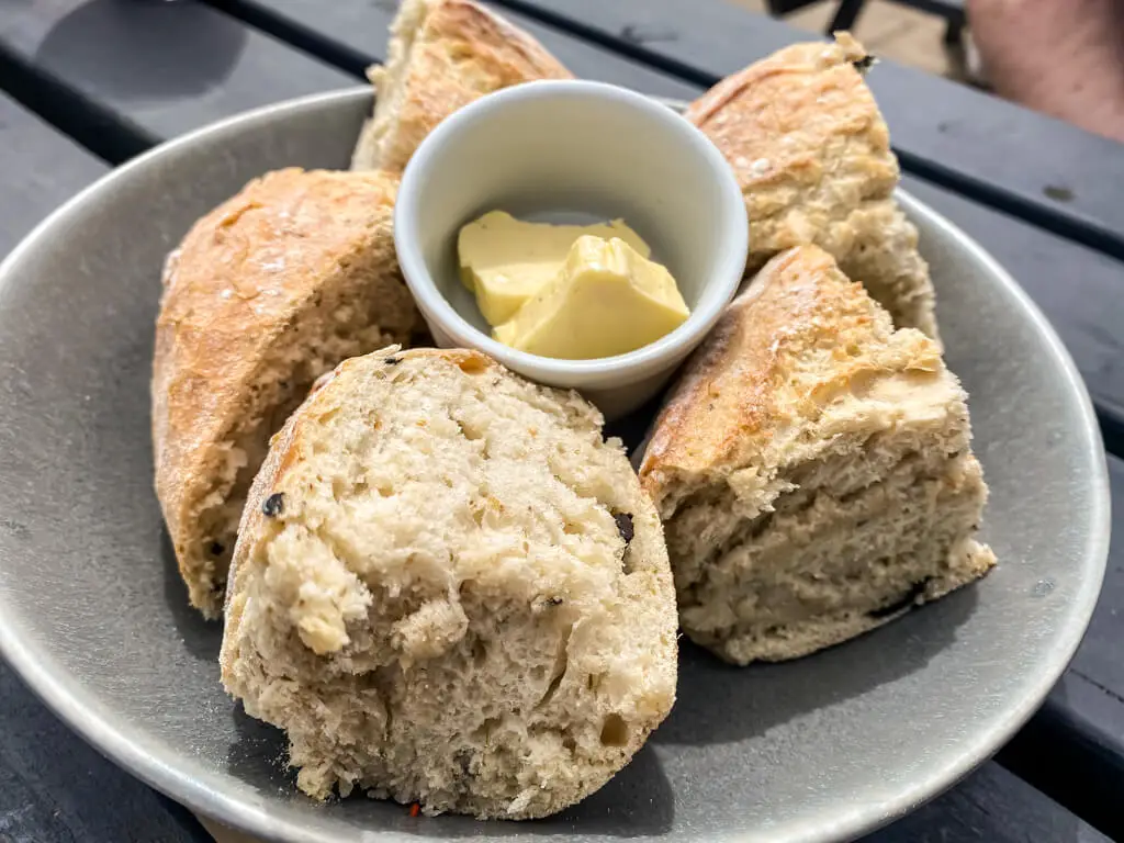 fresh bread with butter accompanied the seafood platter at the maltsters