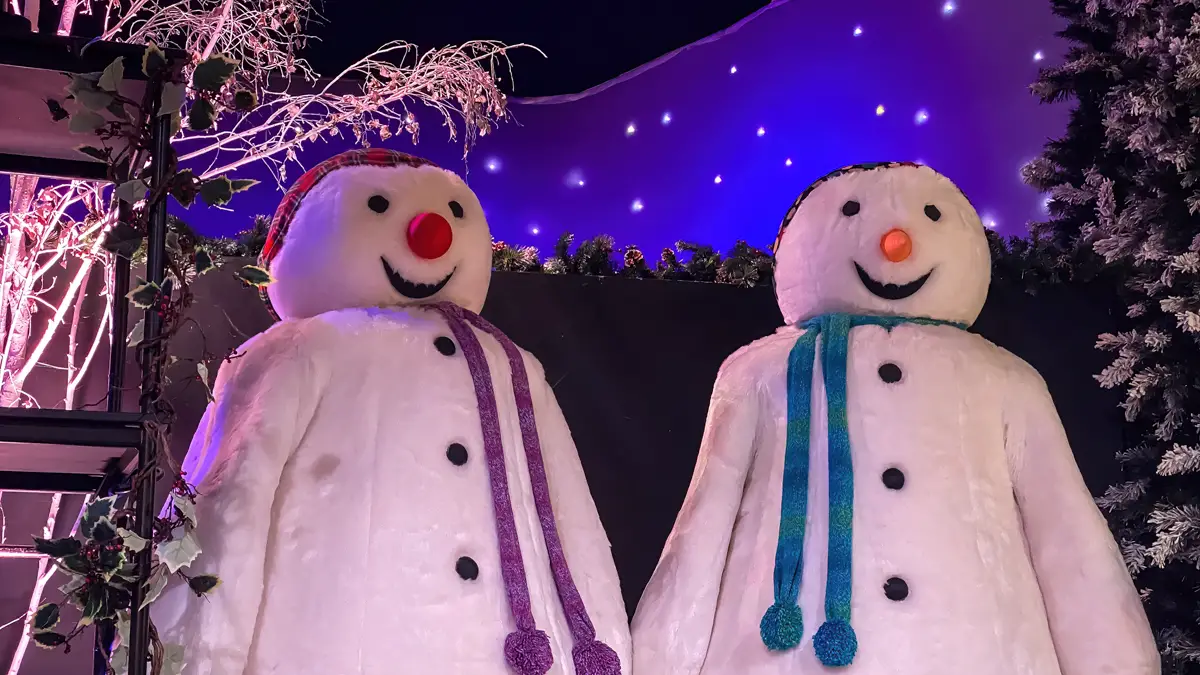 two snowmen on a stage