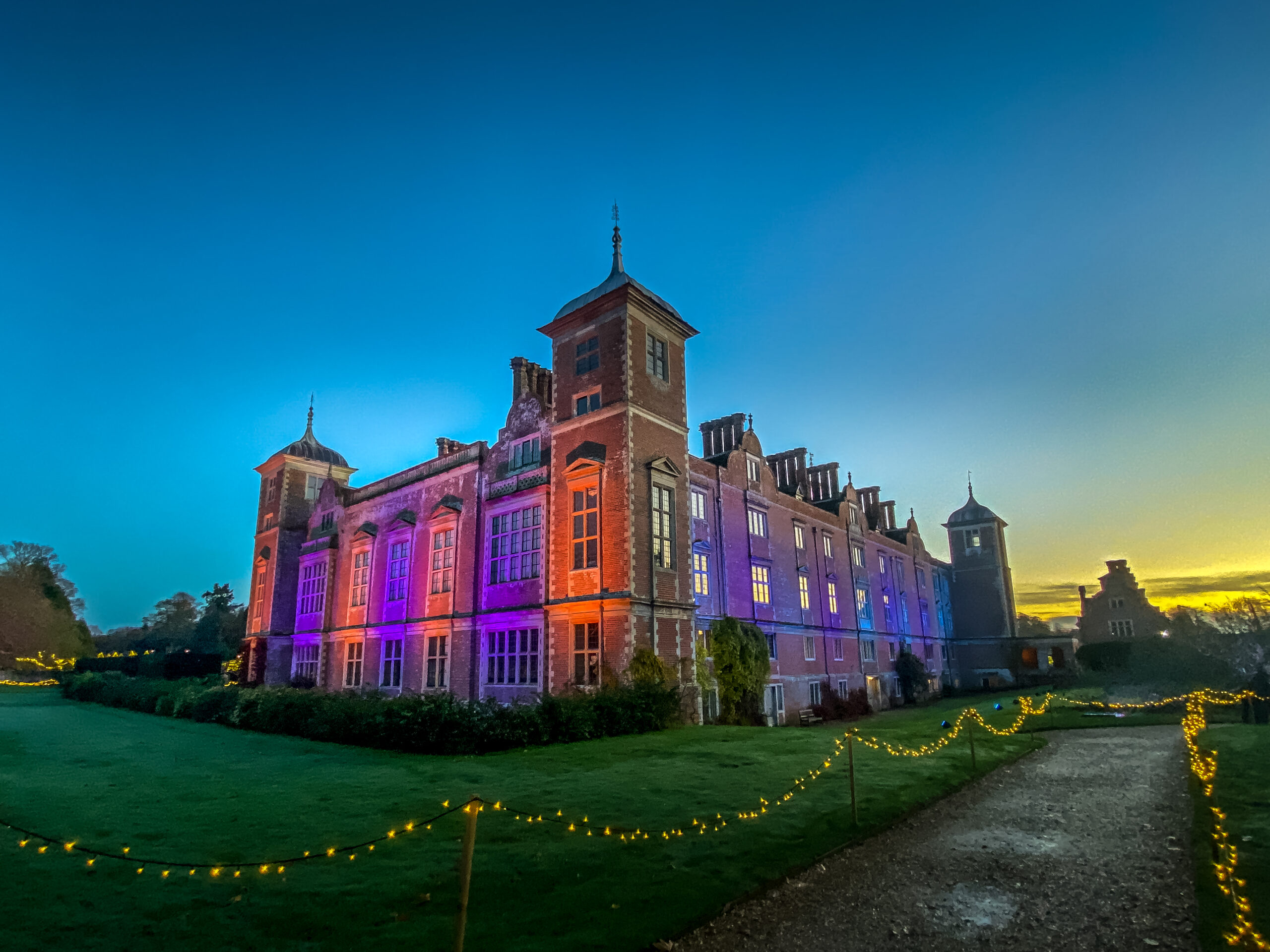 Blicking Hall in Norfolk with its lights up for the Christmas season