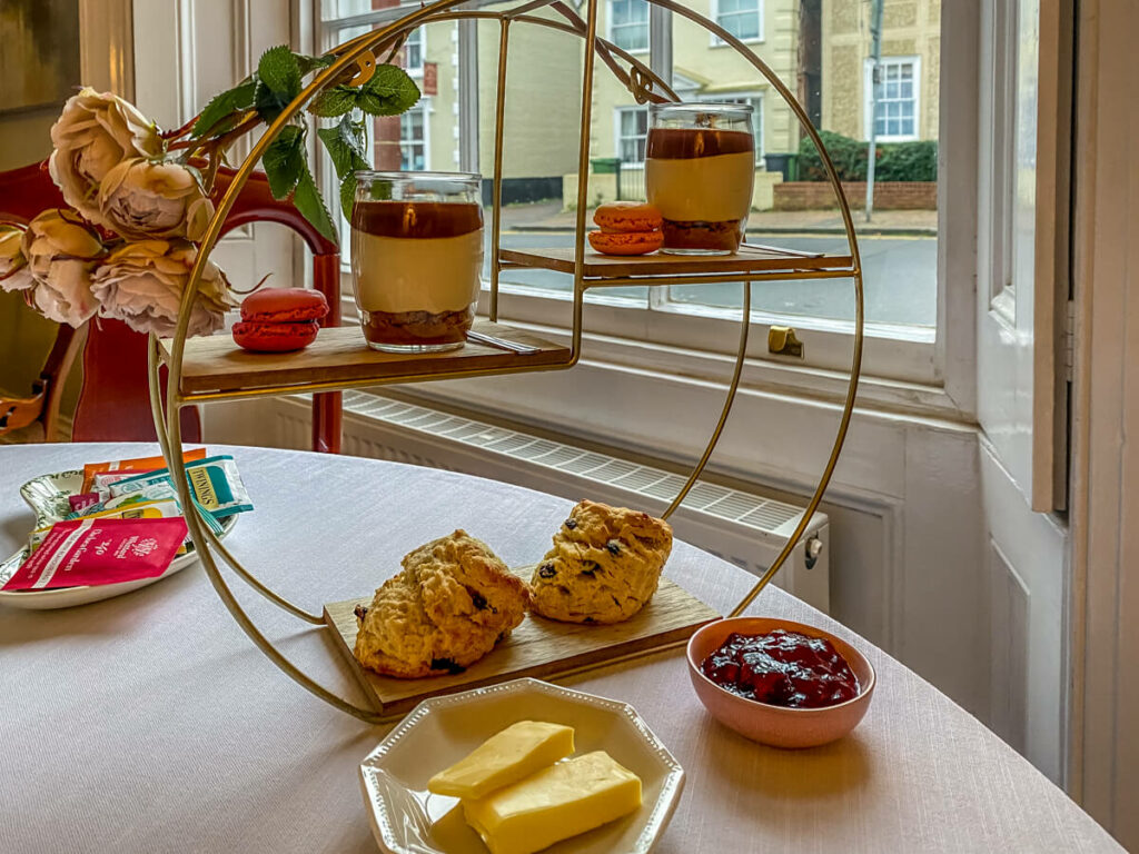 circular shelf unit was used to showcase the afternoon tea at The Old Post Office