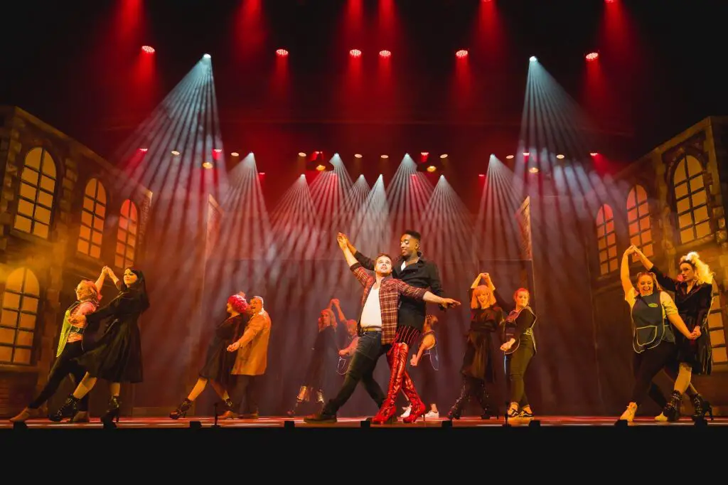 cast of Kinky Boots on theatre royal stage in norwich