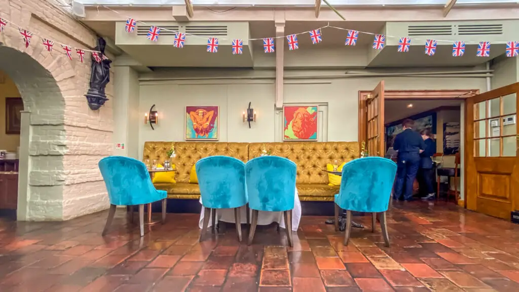 large table in the winepress restaurant at the maids head hotel