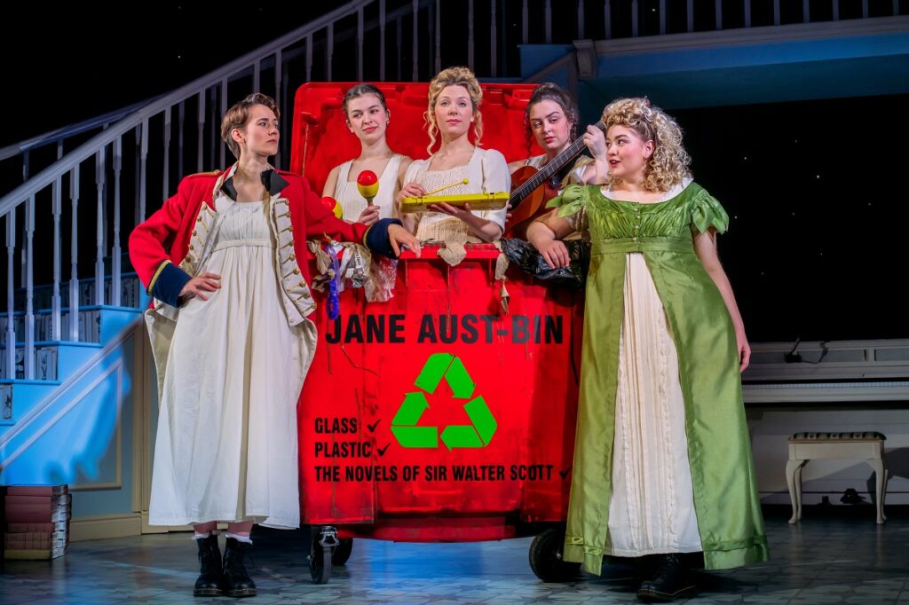 scene by the Jane Aus-bin -  a red recycling bin in pride and prejudice sort of