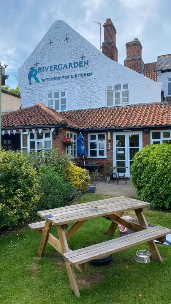 view of the garden looking back towards the rivergarden pub by the river yare