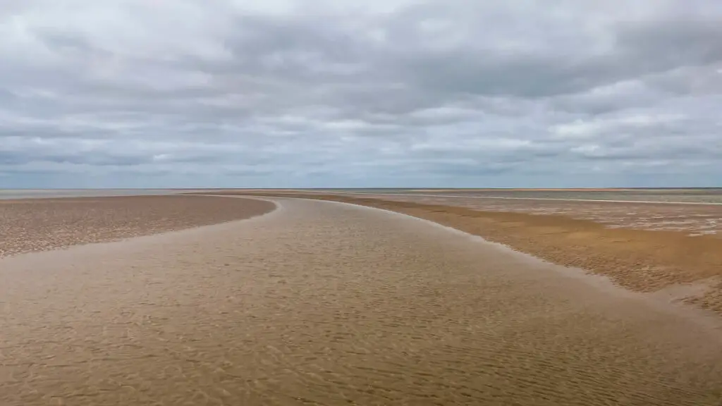 very shallow water in the wash by hunstanton at low tide