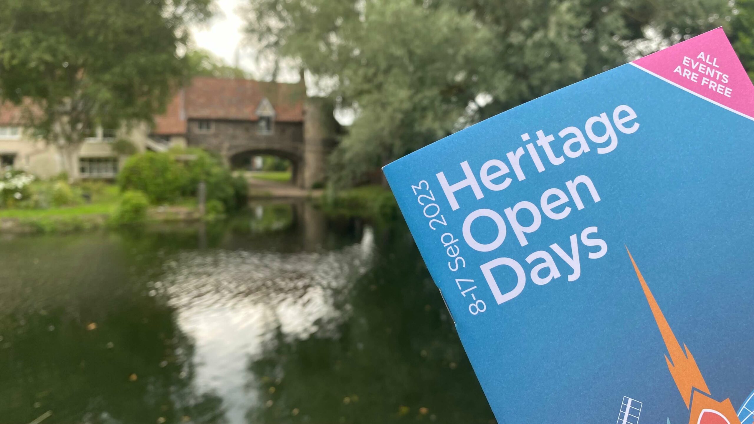 the 2023 heritage open days booklet with a blurred Pull's Ferry in the background