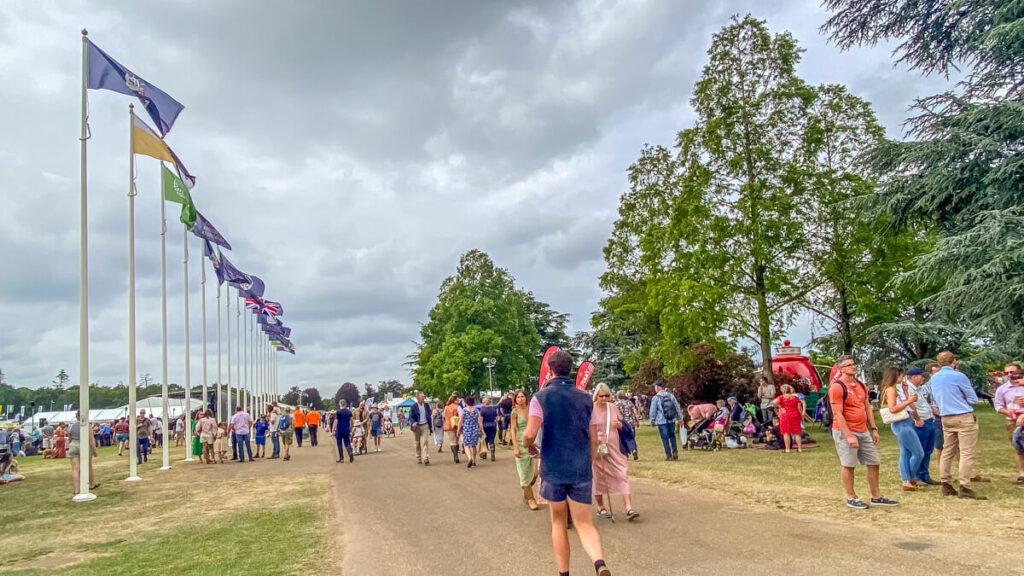 people walking along one of the rows at the royal norfolk show