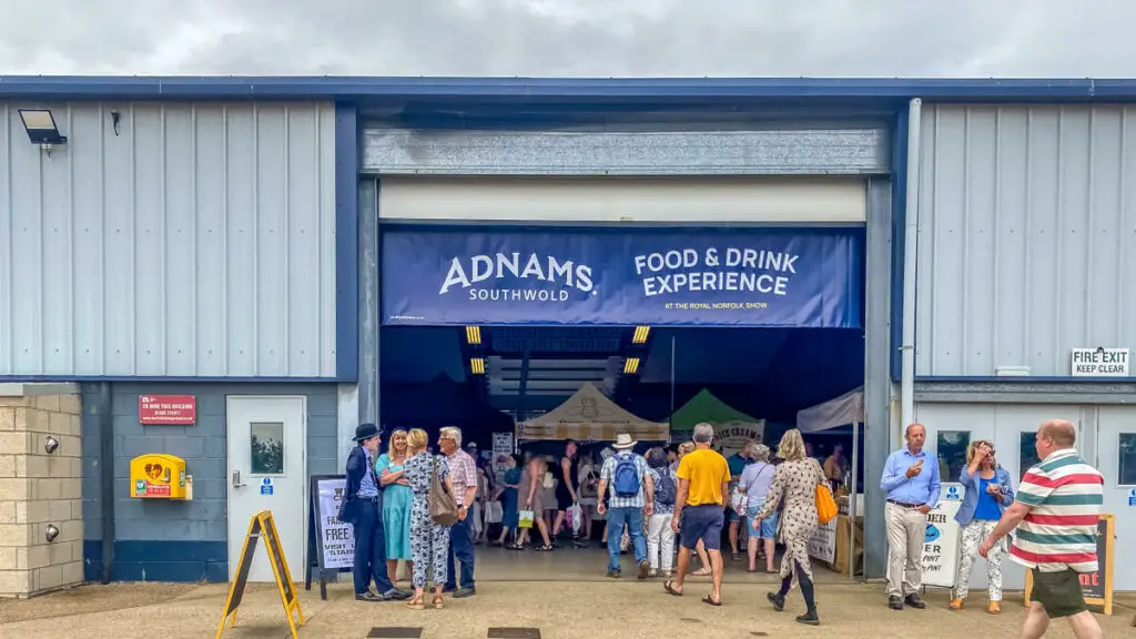 lots of people in front of the Adnams Food Hall at the Royal Norfolk Show