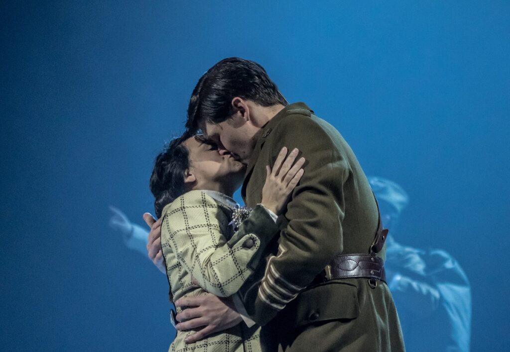 vera and roland in a passionate kiss during the land of might-have-been