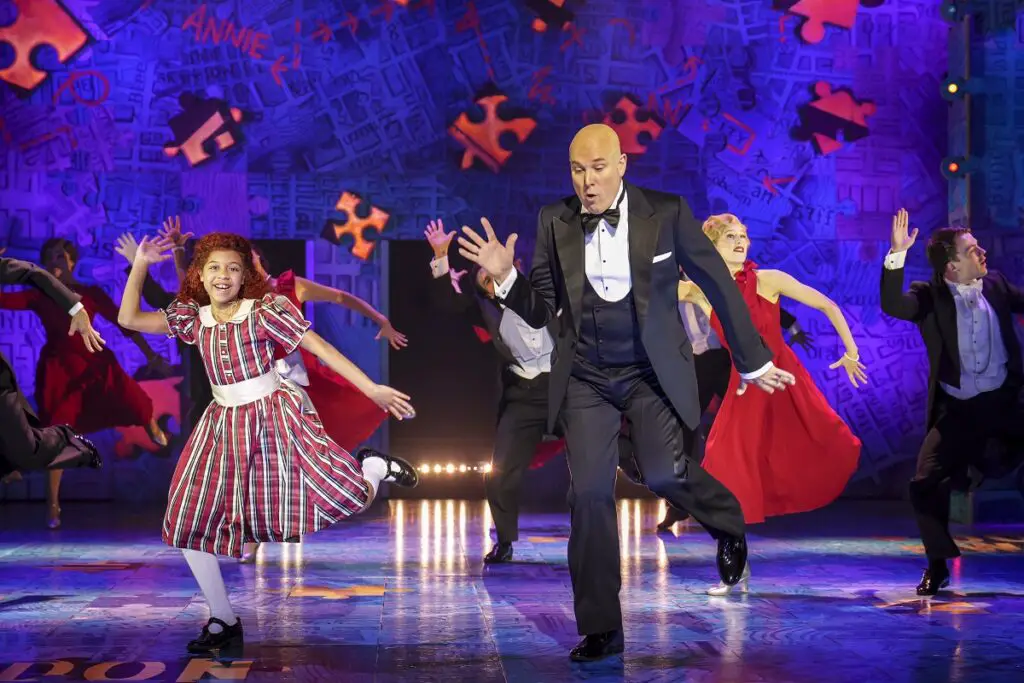 Annie and Daddy Warbucks dancing