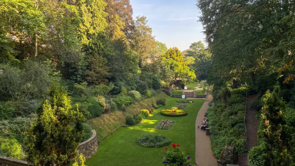 view of the main lawn at the Plantation Garden in Norwich from the Italian Terrace