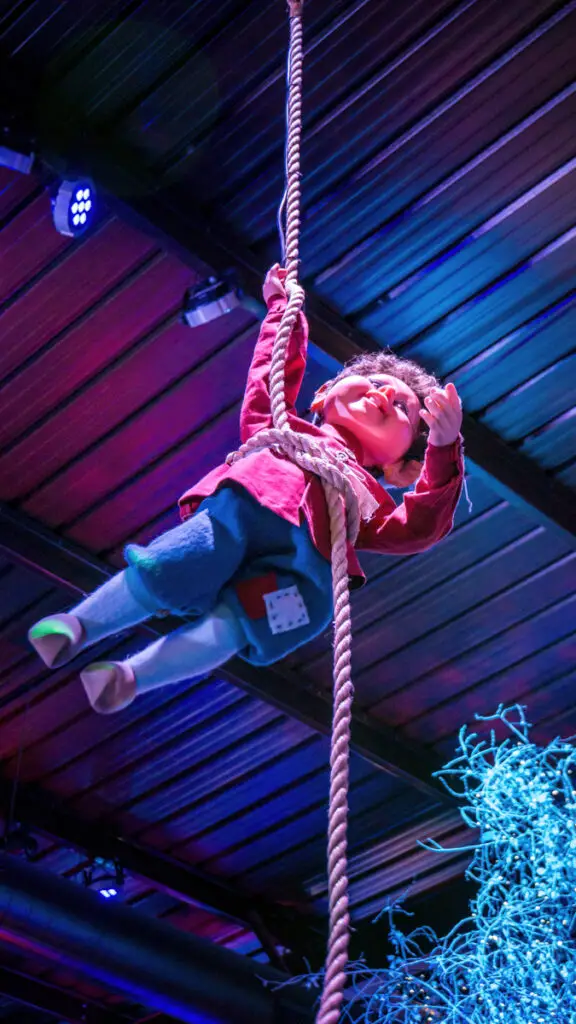 character hanging from the ceiling inside Fantasyland at Thursford