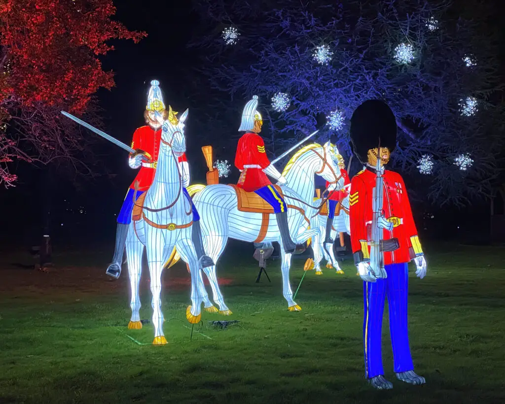 the king'sguard and household cavalry figurines lit up at night at Thursford