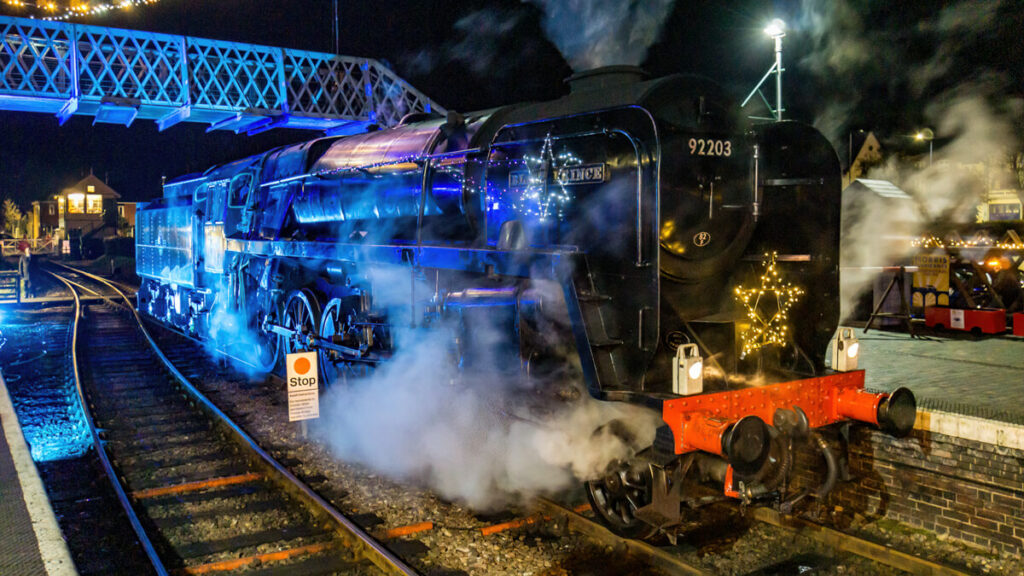 The Black Prince putting on a steam show under the foot bridge.